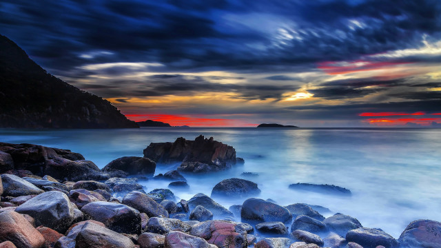 Rocky beach sunset water landsape free wallpaper for desktop - medium preview image