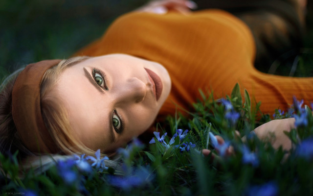 Woman lying flower field blue free wallpaper for desktop - medium preview image