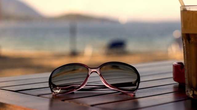 Sunglasses wooden table drink book free wallpaper for desktop - medium preview image