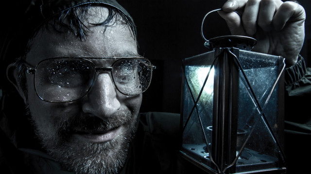 Man glasses lantern light portrait free wallpaper for desktop - medium preview image