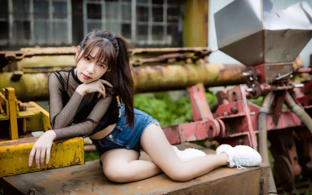 Woman sitting bench machine building free wallpaper for desktop - medium preview image