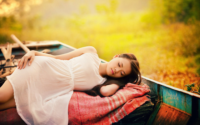 Woman boat water smile autumn free wallpaper for desktop - medium preview image