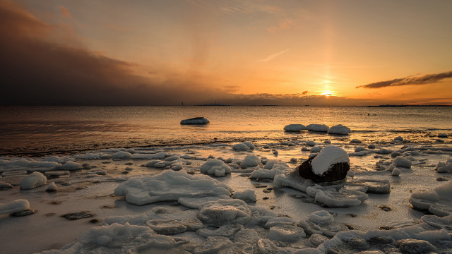 Snowy beach with boats at free wallpaper for desktop - medium preview image