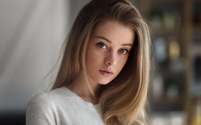 Blonde woman serious portrait bokeh #2 free wallpaper for desktop - medium preview image