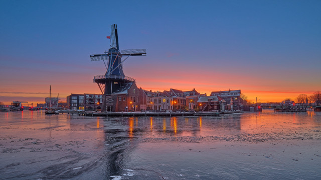 Windmill water city sunset reflection free wallpaper for desktop - medium preview image