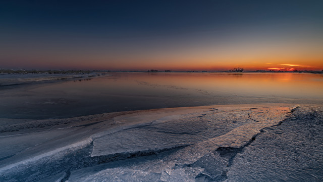 Sunset frozen lake rocks trees free wallpaper for desktop - medium preview image