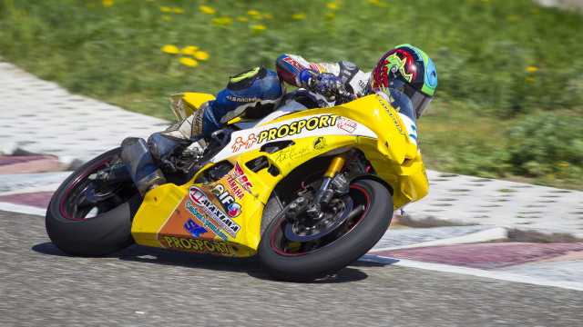 Motorcycle rider yellow helmet race free wallpaper for desktop - medium preview image