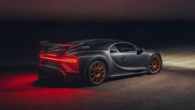Sports car red light dark free wallpaper for desktop - medium preview image