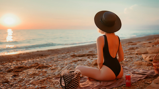 Beach sunset woman hat lap free wallpaper for desktop - medium preview image
