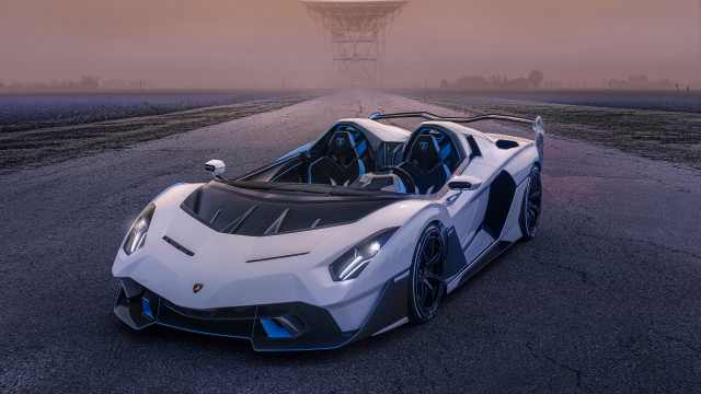 White blue sportscar road tower free wallpaper for desktop - medium preview image