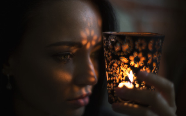 Woman candle dark blurry depthoffield free wallpaper for desktop - medium preview image
