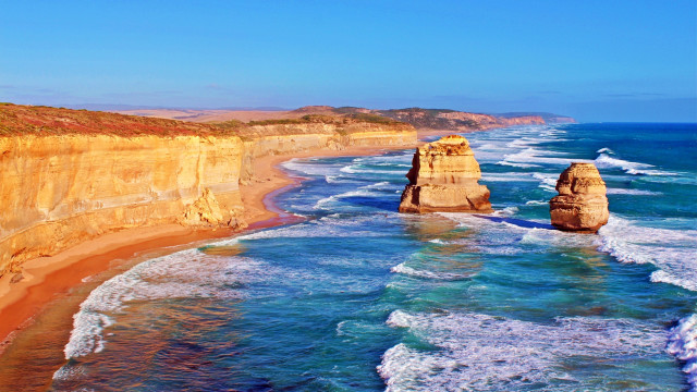 Cliff beach ocean waves tiltshift free wallpaper for desktop - medium preview image