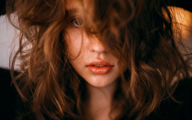 Concerned woman long hair portrait free wallpaper for desktop - medium preview image