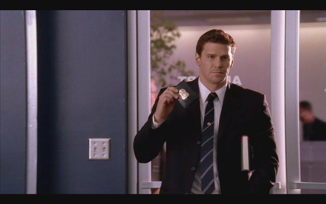 Man suit tie holding looking free wallpaper for desktop - medium preview image