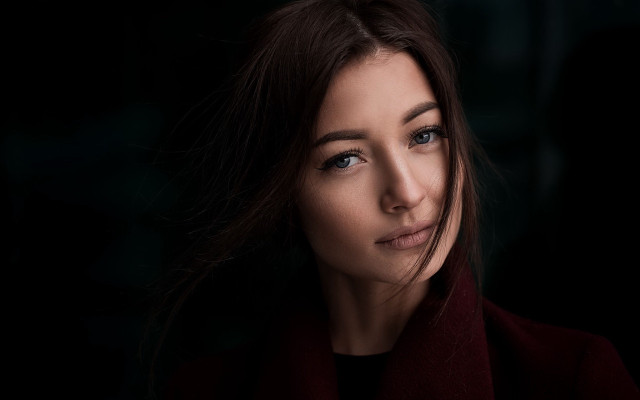 Woman red coat serious look free wallpaper for desktop - medium preview image