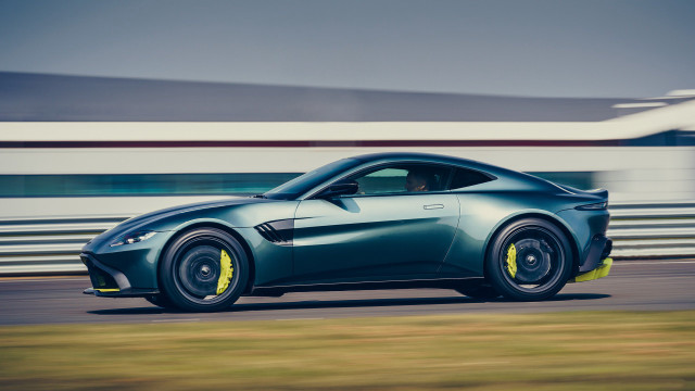 Blue sports car driving track free wallpaper for desktop - medium preview image