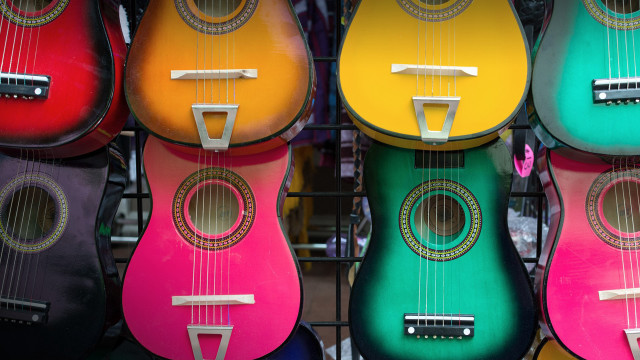 Colorful guitars store display tilt free wallpaper for desktop - medium preview image