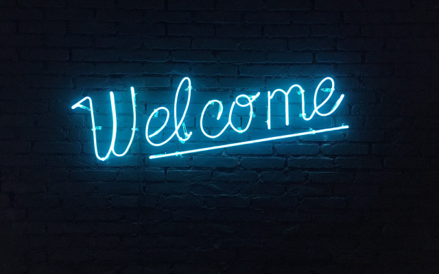 Neon welcome brick wall dark free wallpaper for desktop - medium preview image