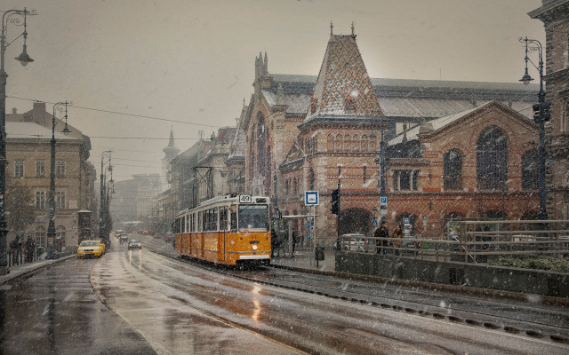 Yellow trolley snowy cityscape architecture free wallpaper for desktop - medium preview image