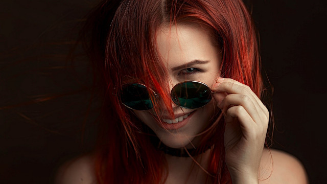 Red hair sunglasses smile portrait free wallpaper for desktop - medium preview image