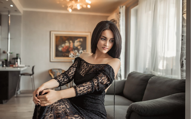 Woman black dress couch livingroom free wallpaper for desktop - medium preview image