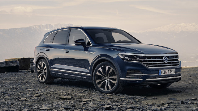 Blue volkswagen suv mountains water free wallpaper for desktop - medium preview image