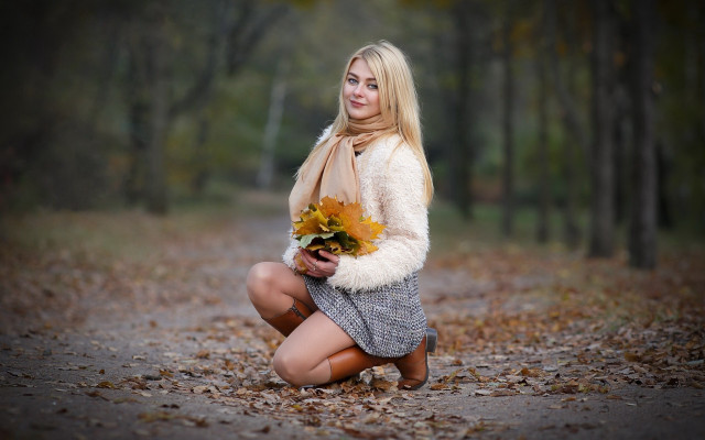 Woman kneeling flowers forest portrait free wallpaper for desktop - medium preview image