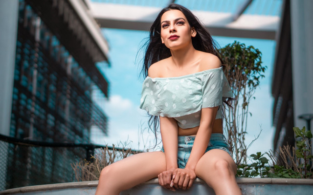 Woman cityscape metal sitting denim free wallpaper for desktop - medium preview image