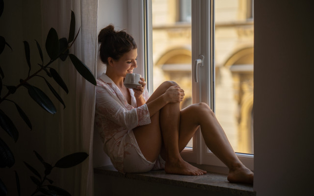 Woman sitting coffee window city free wallpaper for desktop - medium preview image