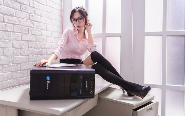 Woman sitting laptop blackstockings glassesskirt free wallpaper for desktop - medium preview image