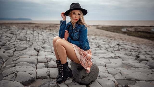 Woman hat boots rocks field free wallpaper for desktop - medium preview image