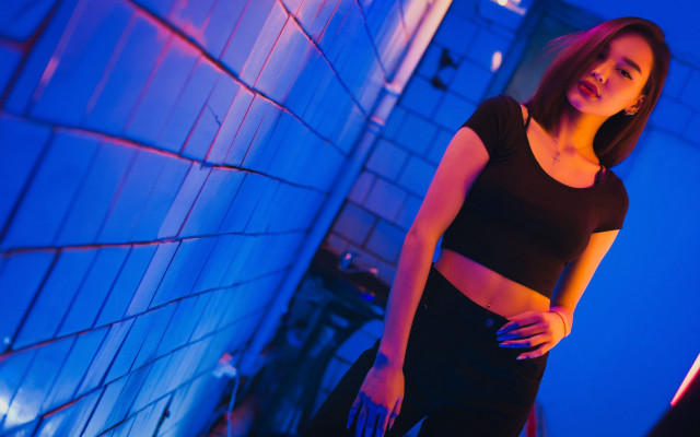 Woman bluewall knife hologram neon free wallpaper for desktop - medium preview image