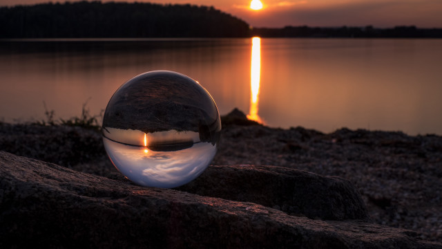 Glass ball rock lake sunset free wallpaper for desktop - medium preview image