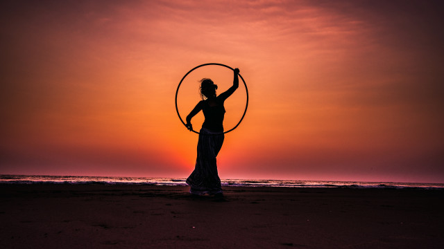 Woman hoop beach sunset cinematic free wallpaper for desktop - medium preview image