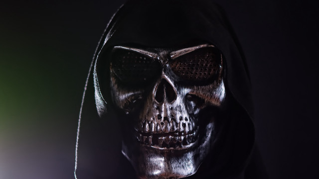 Skull hooded jacket green light free wallpaper for desktop - medium preview image