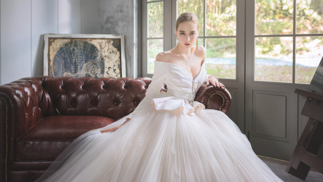 Woman white dress couch window free wallpaper for desktop - medium preview image