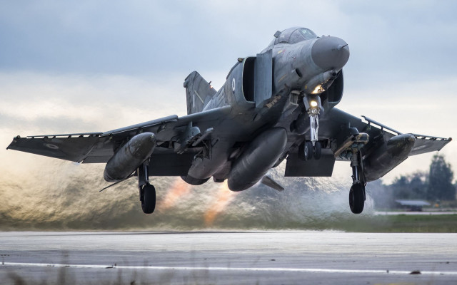 Fighter jet takeoff smoke puzzle free wallpaper for desktop - medium preview image