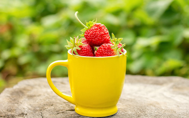 Yellow cup strawberries wooden table free wallpaper for desktop - medium preview image