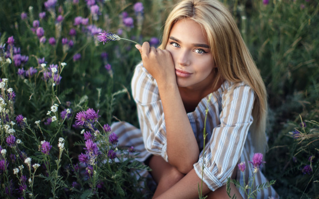 Woman flower field serious portrait #3 free wallpaper for desktop - medium preview image