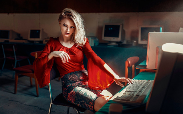 Woman red shirt computer desk free wallpaper for desktop - medium preview image