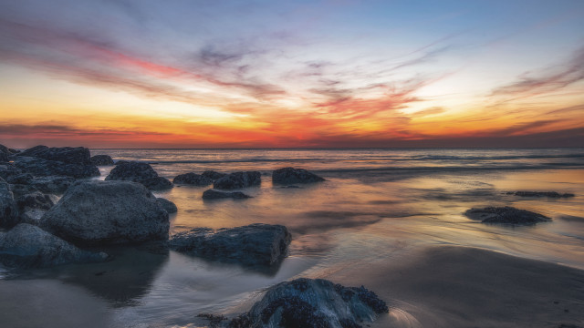 Sunset ocean rocks mountains mystical free wallpaper for desktop - medium preview image