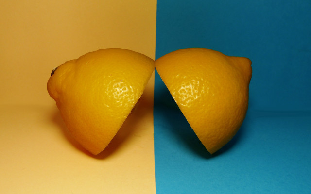 Two oranges blue yellow background free wallpaper for desktop - medium preview image