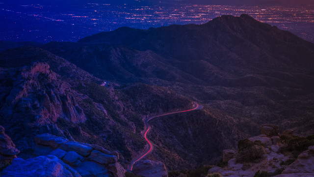 Mountain road night city lights free wallpaper for desktop - medium preview image