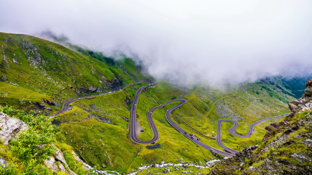 Winding road mountains cloudy sky free wallpaper for desktop - medium preview image