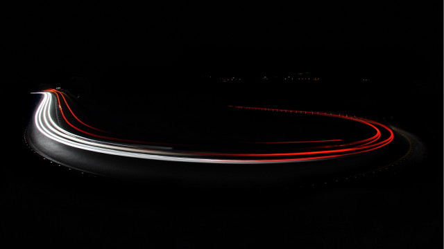 Curved road redlight night motion free wallpaper for desktop - medium preview image