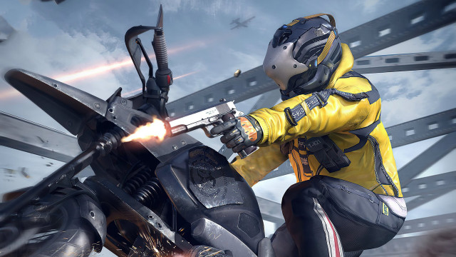 Man yellow jacket shooting motorcycle free wallpaper for desktop - medium preview image