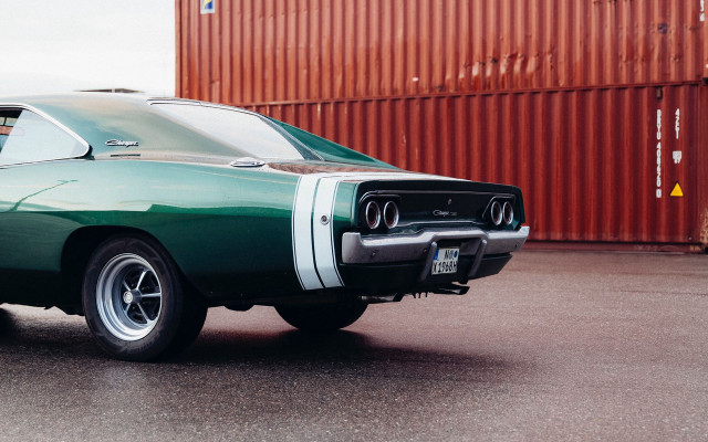 Green car red building photorealism free wallpaper for desktop - medium preview image