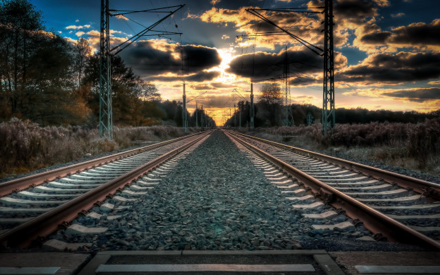 Train track sunset clouds cityscape free wallpaper for desktop - medium preview image