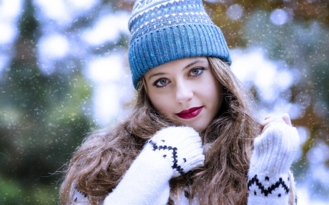 Woman blue hat white sweater free wallpaper for desktop - medium preview image