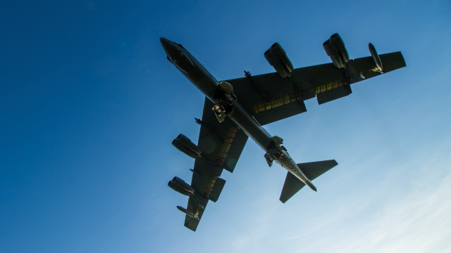 Large jet flying blue sky free wallpaper for desktop - medium preview image